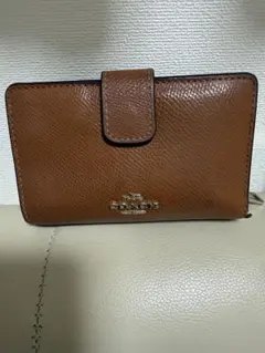 COACH  長財布　ラウンドファスナー馬車ブラウン COACH コーチ 長財布 ラウンドファスナー 馬車ロゴ ブラウン系｜Yahoo