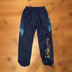 ATHLETA ピステパンツ ナイロンパンツ　ネイビー　130サイズのサムネイル