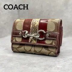 COACH シグネチャー柄 三つ折り財布 パイソンキャンバス 配色