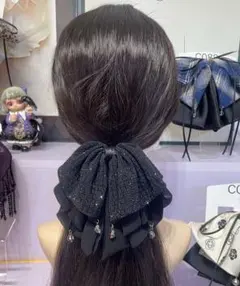 黒いリボン型ヘアアクセサリー
