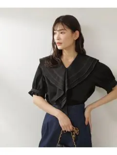 ナチュラルビューティベーシック バイカラーステッチラッフルブラウス ブラック