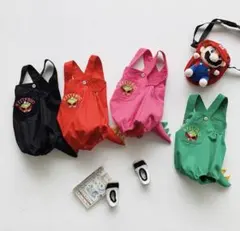 恐竜のしっぽ付きオーバーオール