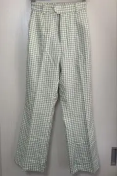 NICE CLAUP 緑のチェック柄フレアパンツ