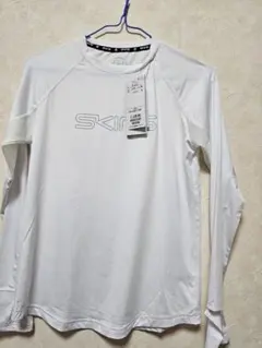 【新品】SKINS ホワイト 長袖 Tシャツ sサイズのサムネイル