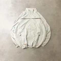 90sナイキ古着NIKEナイロンジャケット刺繍ロゴ淡グレードローコードDB479