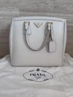 PRADA トライアングル 2WAY ハンドバッグ レザー アイボリー - メルカリ