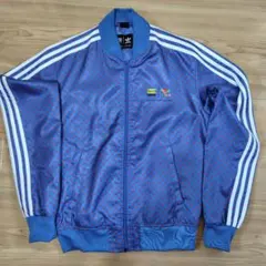 アディダス ファレル ウィリアムのコラボ ブルーのドット柄 トラックジャケット