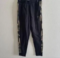 新品】アディダス×マリメッコ コラボ スナップパンツ ウニッコ 花柄 黒
