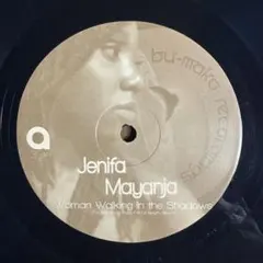 Jenifa Mayanja - Woman Walking in the S