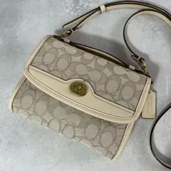 ✨美品✨コーチ　キップ　ターンロック　クロスボディ　シグネチャー　ジャカード　白
