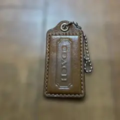 コーチ レザータグ チャーム キーホルダー ブラウン