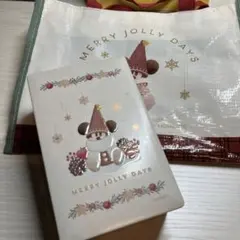 ディズニー　ミッキー　リルリンリンお菓子の空き缶とビニール素材ショッパー