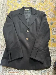 ブラック テーラードジャケットとフレアパンツ セット