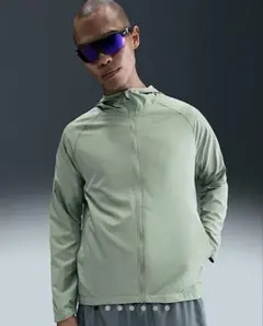 平野紫耀 ナイキ　ランニングジャケット　パーカー　Lサイズ　グリーン NIKE [新品] 着用 L スウッシュ ウーブン ナイロンジャケット ナイキ ウォーキング・ランニングウェア