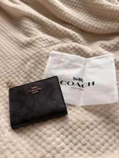 COACH 二つ折り財布 シグネチャー ブラウンのサムネイル