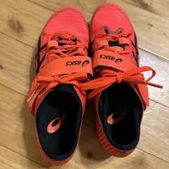 ASICS スパイクシューズ 赤/黒