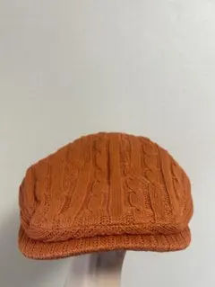 genNyu オレンジ ケーブル編み ハンチング帽
