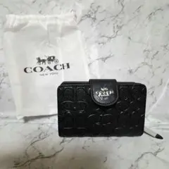 COACH 二つ折り財布 ブラック シグネチャー