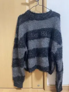 グレーとブラックのストライプセーター