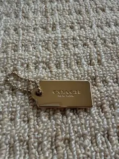 COACH メタルタグ キーホルダー ゴールド