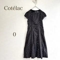 コテラック　ワンピース　フレンチスリーブ　ブラック　フェイス柄　ギャザー 個性的