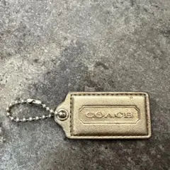 COACH ゴールドレザー タグチャーム
