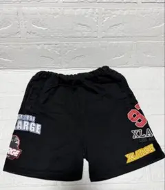 XLARGE KIDS ロゴ総柄ハーフパンツ ブラック ショートパンツ 80cmのサムネイル