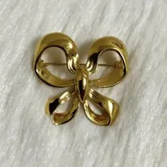 イヴ・サンローラン リボン ブローチ ゴールドのサムネイル