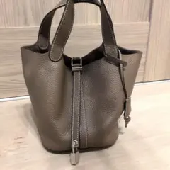 BARNEYS NEWYORKメッシュ レザーハンドルの雑材バッグ - メルカリ