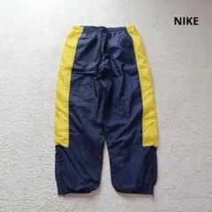 ナイキ NIKE トラックパンツ S相当 紺×黄 サイドライン テック 古着