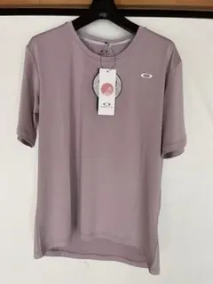 【最終価格】Oakley 薄紫 Tシャツ 新品タグ付き　女 Lのサムネイル