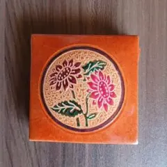 花柄エンボス加工オレンジコインケース