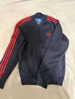 adidas スーパースタートラックジャケット ネイビー/レッド