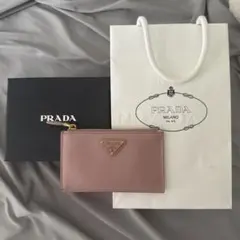 PRADA】プラダ 折り畳み財布 ピンク美品【正規品証明書付き】 - メルカリ