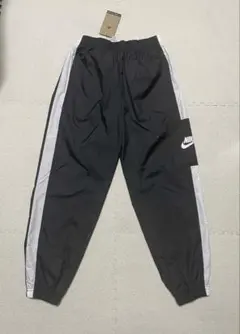 [新品]NIKE Lウィメンズ ナイロンパンツ CJ7347-010ブラック