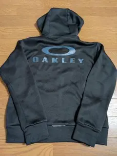 Oakley ブラック パーカー フード付き - メルカリ