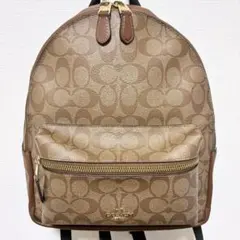 COACH シグネチャー柄 チャーリー バックパック - ブラウン