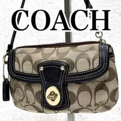 希少✨COACH コーチ　ポーチシグネチャー キャパシティフラップリストレット