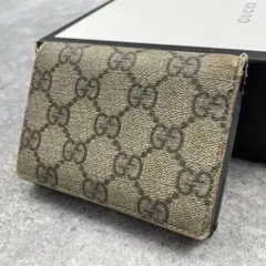 GUCCI グッチ 折り財布　PVC　GGスプリーム　ベージュ　総柄　レザーのサムネイル