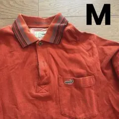 Lacoste オレンジ 長袖ポロシャツ