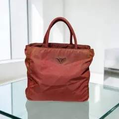 ゆ*ゆ様 PRADA オレンジ ナイロンドローストリングバッグ - メルカリ