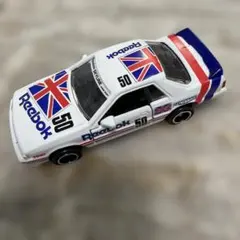 トミカ リーボック レーシングスカイライン R31 ミニカー 日産 国旗 ロゴのサムネイル
