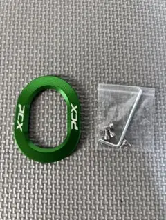 新品・未使用 PCX JK05 KF47 純正マフラーエンドカバー グリーンのサムネイル
