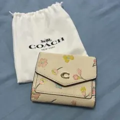 COACH 三つ折り財布 花柄 ベージュ　※破れありのサムネイル