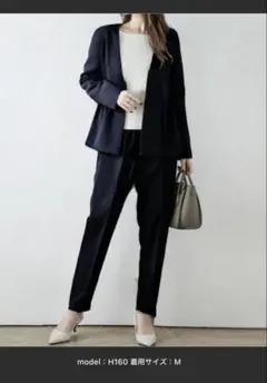 ネイビー ペプラムデザイン パンツスーツ Mサイズ