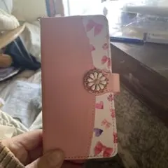手帳型スマホケース ピンクと白のリボン