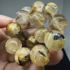 □113 大玉 ブレスレット z8065太陽放射ゴールドタイチンルチルクォーツ□