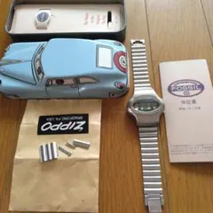 ジャンク品　FOSSIL JR-7751 時計 ROAD TRIP 　ケース付きのサムネイル