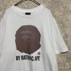 希少】A BATHING APE × KAWSリンガーTシャツ カモフラロゴ - メルカリ