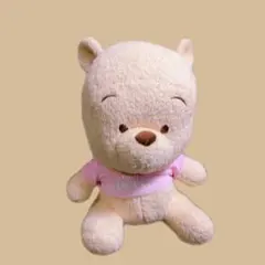 プーさん　ベージュのクマのぬいぐるみ（ピンクの服）